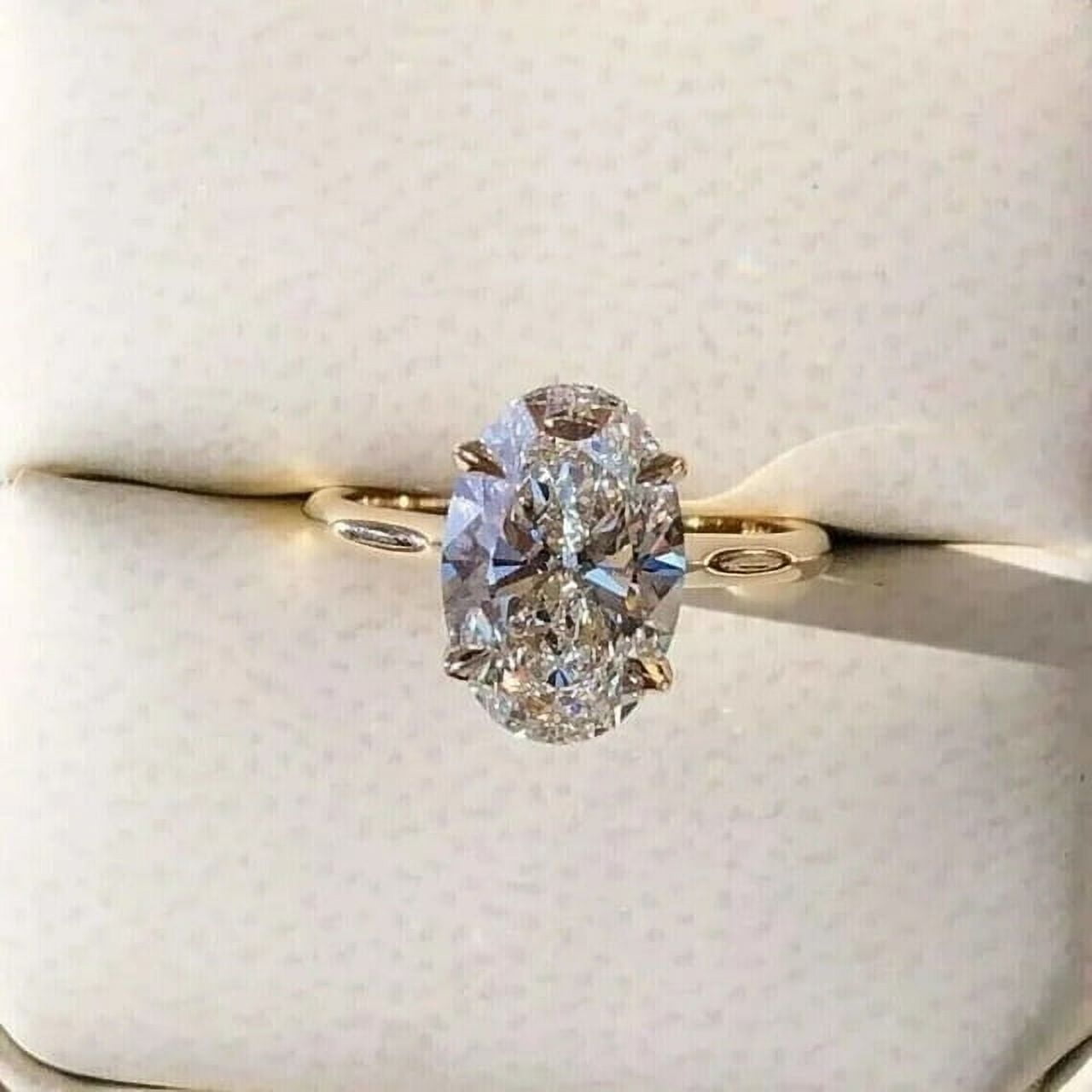 2CT Oval-Cut Lab Created Diamond Hidden Halo Engagement Ring 14K Yellow Gold Plated Silver
