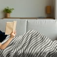 thumbnail image 3 of Geometric Soft Flannel Fleece Throw Blanket, Hatching Lines Inspired Skew Bold and Thin Stripes Repeating Diagonally, Cozy Plush for Indoor and Outdoor Use, 50" x 70", Coconut and Black, by Ambesonne, 3 of 5