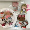 thumbnail image 1 of Soporte de Hello Kitty apto para cualquier teléfono móvil, soporte para airbag, 3 m, pasta de escritorio, artefacto perezoso, dibujos animados, lindo, 1 of 5