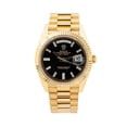 thumbnail image 1 of Pre-Owned Rolex Day-Date 40MM 228238 Black Baguette Diamond Dial Fluted Bezel 18K Yellow Gold President Bracelet, 1 of 9
