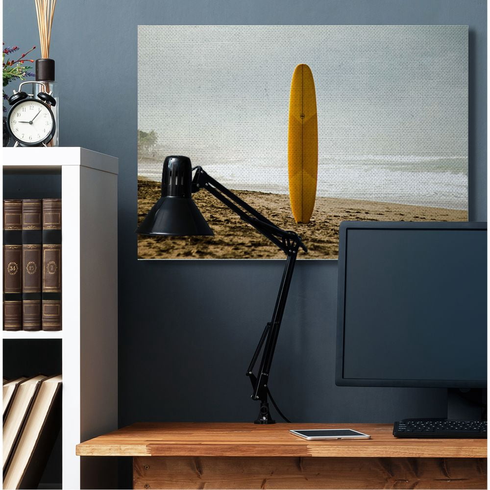 Stupell Industries Yellow Surfboard in Sand Near Shore Photograph Designed by Unsplash