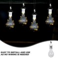 thumbnail image 3 of Lámpara de luz LED colgante giratoria impermeable con energía solar para exteriores, jardín, camping (carcasa transparente con luz blanca cálida), 3 of 4