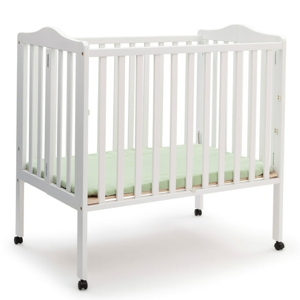 Delta Children Folding Portable Mini Crib With Mattress White