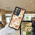 thumbnail image 2 of Añade un toque de diversión a tu iPhone con una funda protectora única y protectora con gráficos de dibujos animados., 2 of 4