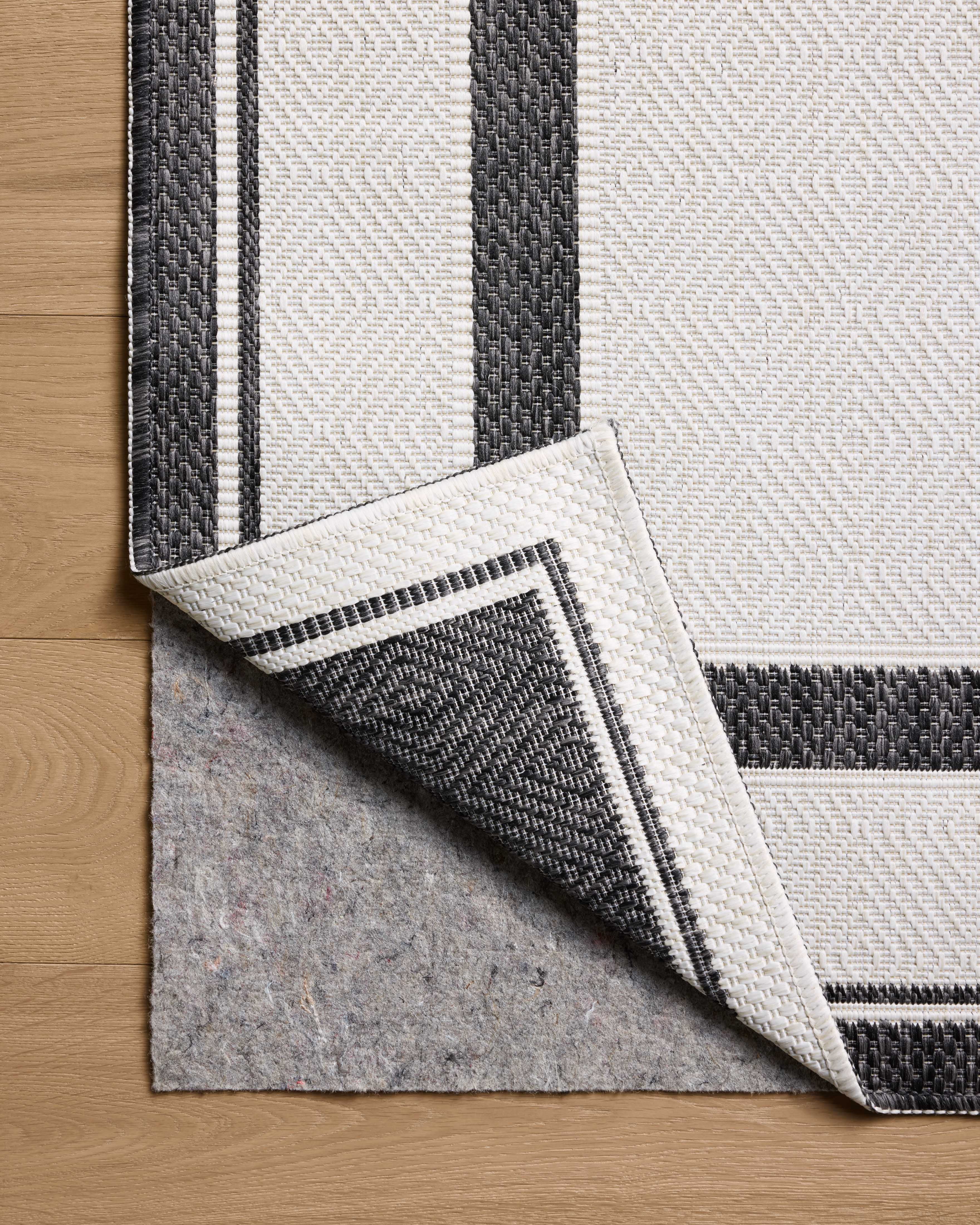 Indoor Outdoor Rug 7x9, Reversible, Loloi Easton Onyx / Ivory (6'7" x 9'4")