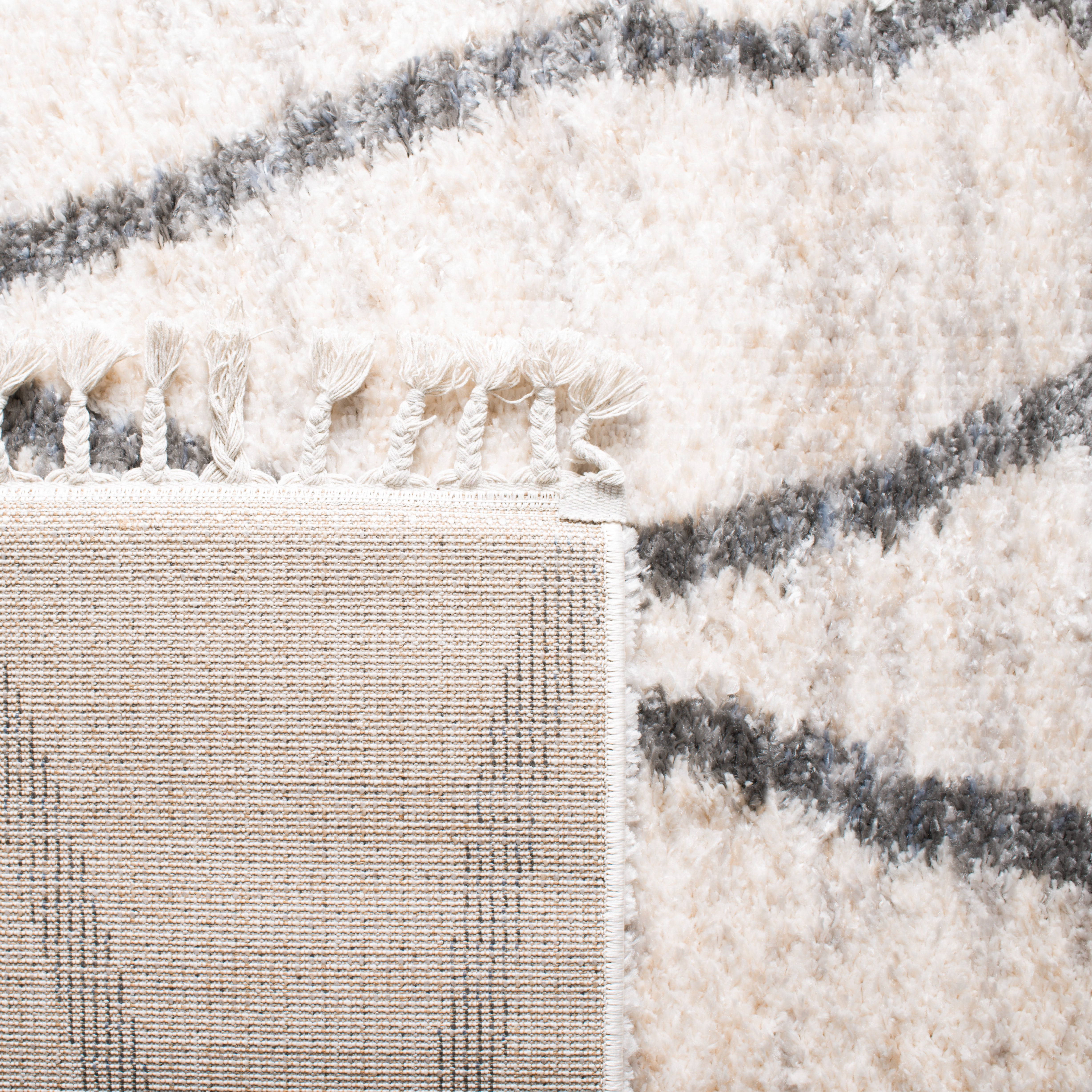SAFAVIEH Berber Fringe Amyas Geometric Shag Runner Rug, Creme/Black, 2' x 8'