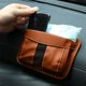 thumbnail image 5 of Bolsa de almacenamiento para coche | Organizador multifuncional de malla con soporte para teléfono | Caja de almacenamiento colgante adhesiva de cuero para coches | Múltiples bolsillos para llaves, 5 of 6