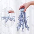 thumbnail image 3 of Jinsinto Indoor Outdoor Clothes Drying Rack, 24 Foldable Hanging Clothes Dryer Clips, Sock Drying Rack, 3 of 5