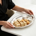 thumbnail image 6 of Oval Stainless Steel Platter, Embossed Decorative Platter For Dessert & Appetizers, Wedding Table Decor Tray, 9.65×6.89 Inch Silver Oval Metal Serving Tray Corrosion-Resistant Surface, 2Pcs, 6 of 6