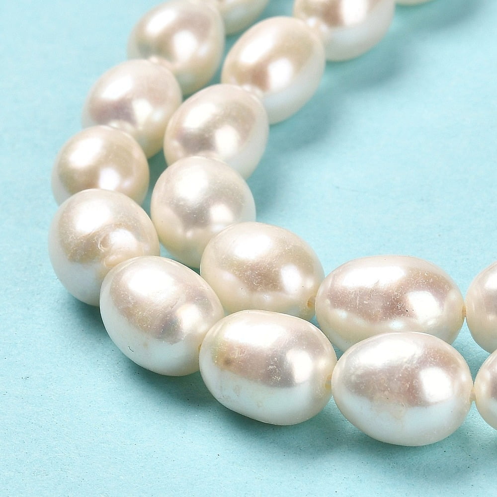 1strand Natural Cultured Freshwater Pearl Beads Strands Rice Grade AAAAA Seashell color 9.5~10x8~9mm Hole: 0.6mm about 37~38pcs/strand 14.76~15.16inch