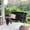 Black, variant on Cambridge Casual Bonn Hanging Wood Porch Swing - Black