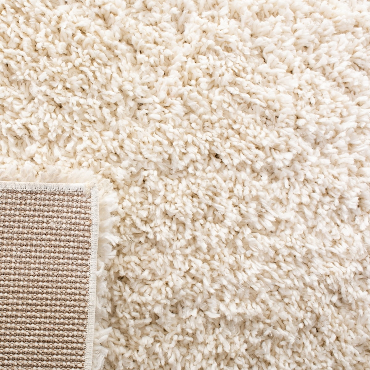 SAFAVIEH August Sophia Solid Plush Shag Area Rug, Ivory, 5'3" x 7'6"