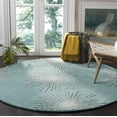 thumbnail image 2 of SAFAVIEH Soho Fiesta Geometric Area Rug, Light Teal/Multi, 6' x 6' Round, 2 of 9
