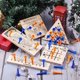 thumbnail image 3 of Juego de mesa de madera surtido con 5 tableros de madera de diferentes estilos, piezas de plástico y dados. Incluye juego de ingenio y rompecabezas., 3 of 5