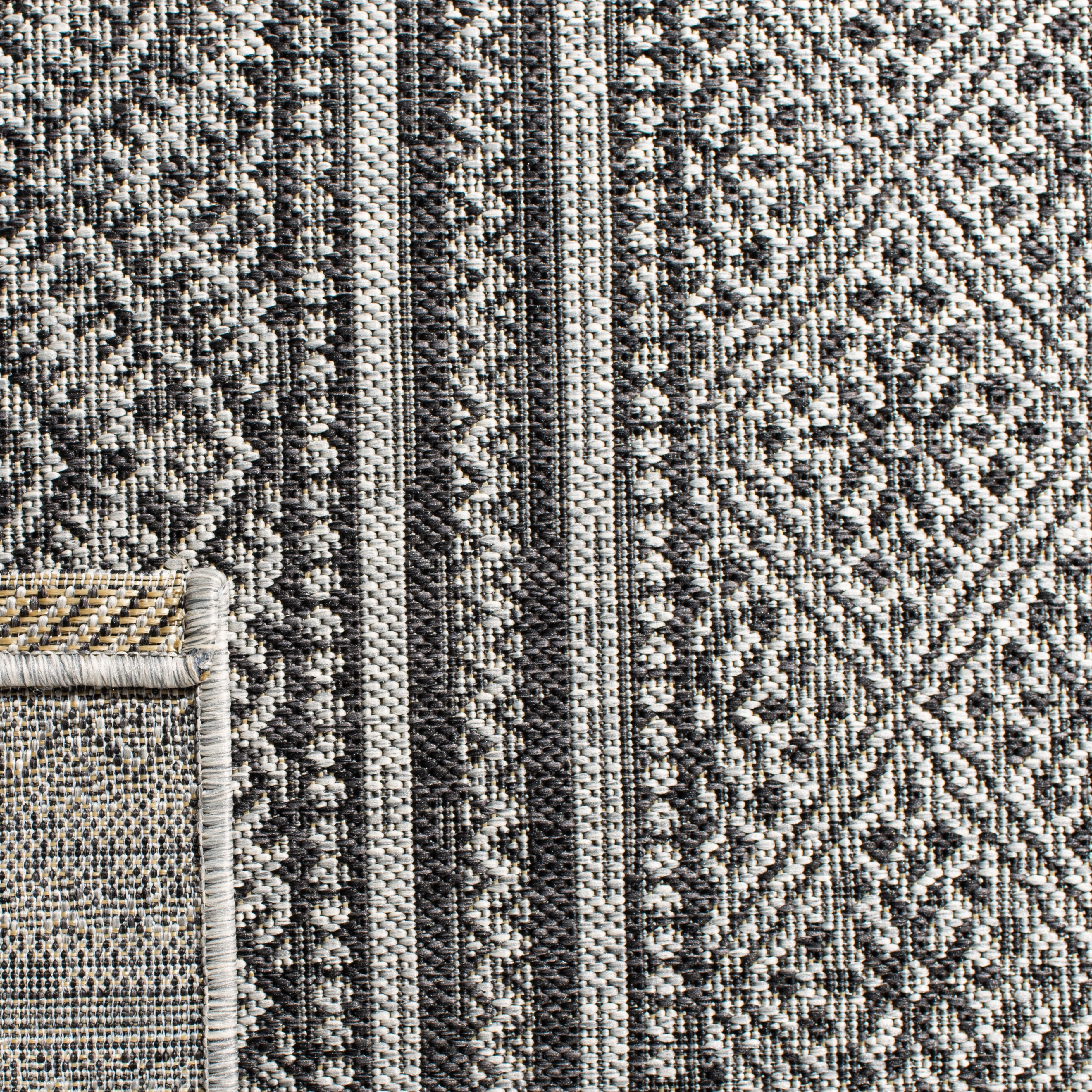 SAFAVIEH Courtyard Eric Geometric Chevron Indoor/Outdoor Area Rug, 5'3" x 7'7", Black/Grey