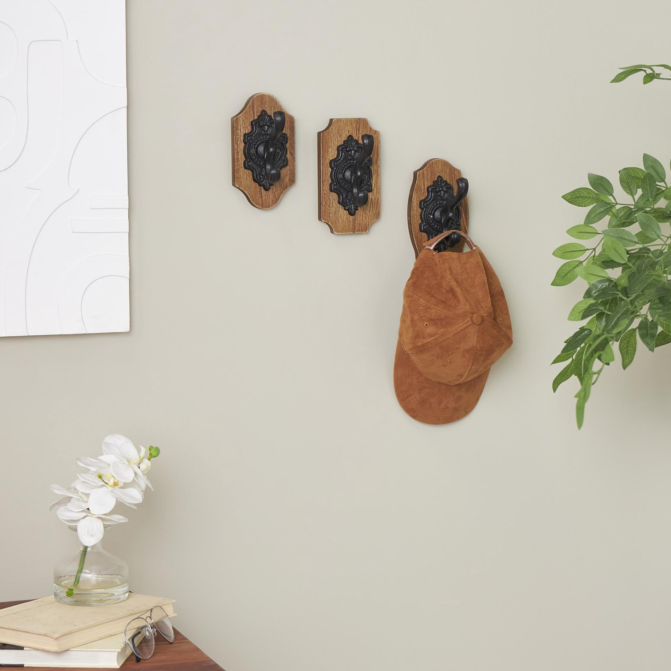 DecMode 4"W, 6"H Brown Wooden Vintage Inspired Fleur De Lis Wall Hook with Black Metal Hooks and Curved Edges, 3-Pieces