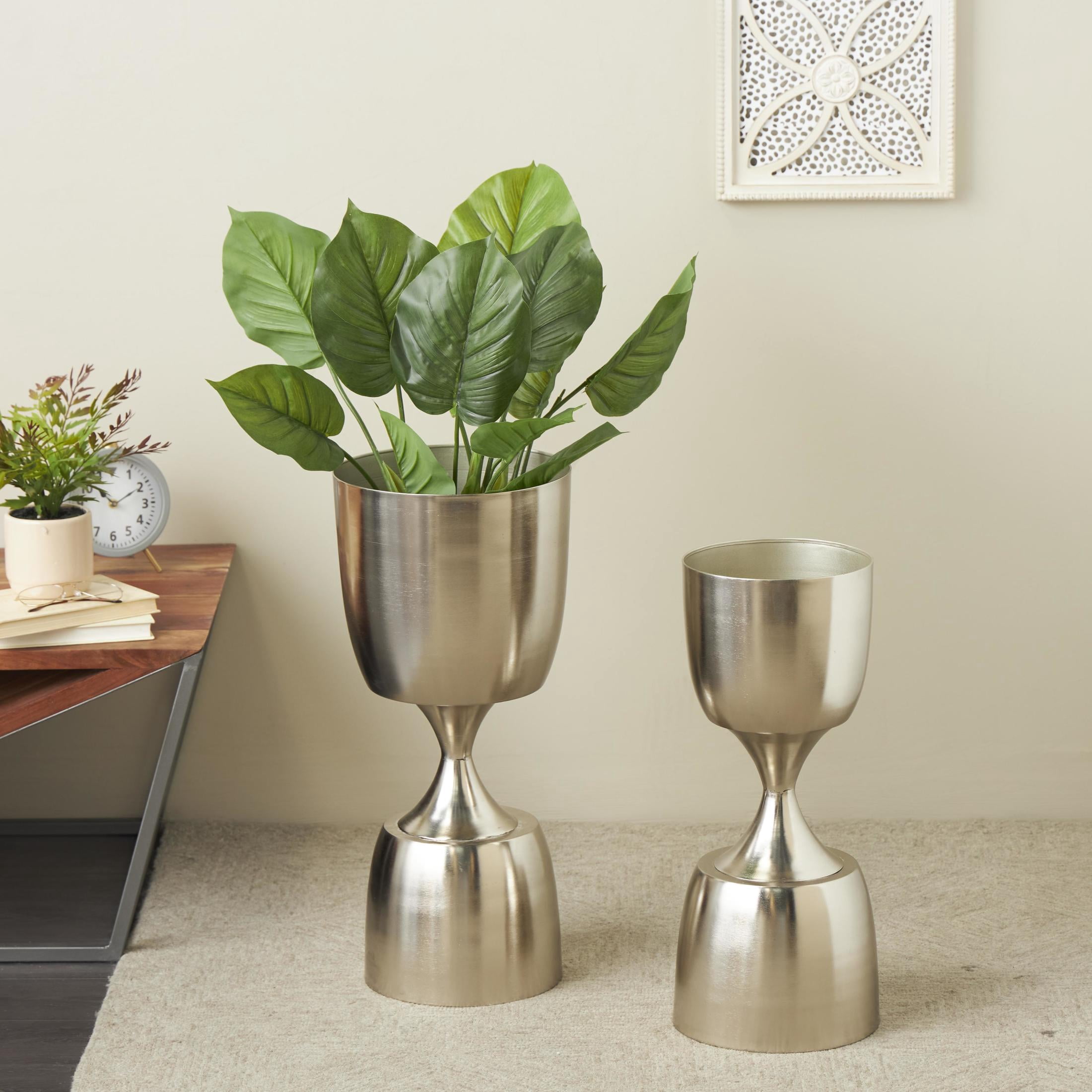 DecMode 26", 23"H Hourglass Shaped Silver Metal Planter with Elevated Base (2 Count)