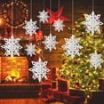 thumbnail image 1 of Adornos colgantes de copos de nieve para Navidad, 6 piezas de guirnaldas de copos de nieve 3D con purpurina blanca grande para Navidad, invierno, país de las maravillas, vacaciones, fiesta, 1 of 7