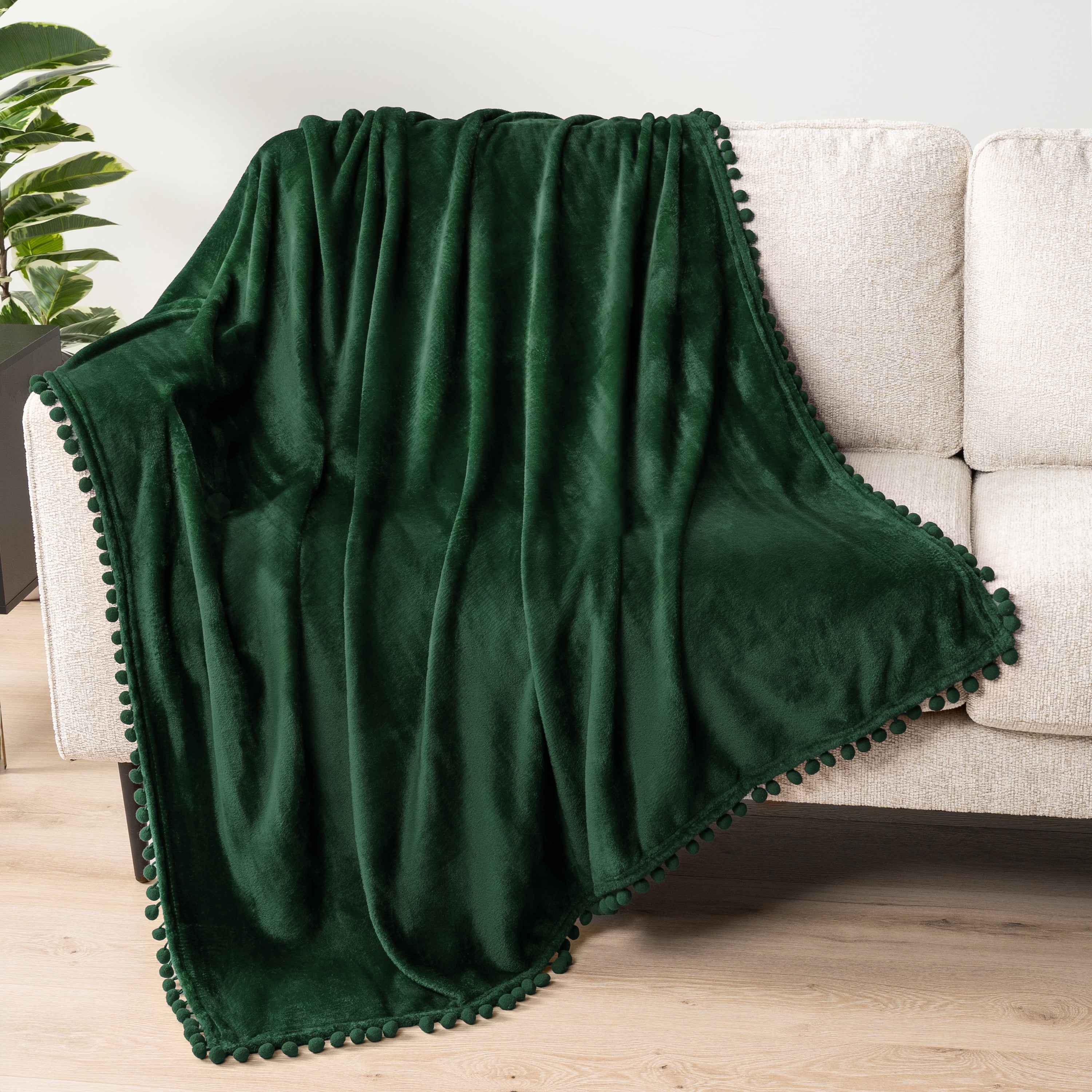 PAVILIA Fleece Throw Blanket for Couch with Pom Pom Fringe, Emerald Green, Soft Cozy Fuzzy Flannel Blanket for Sofa Bed, Large Lightweight Plush All Season Throw, 60x80 Inches