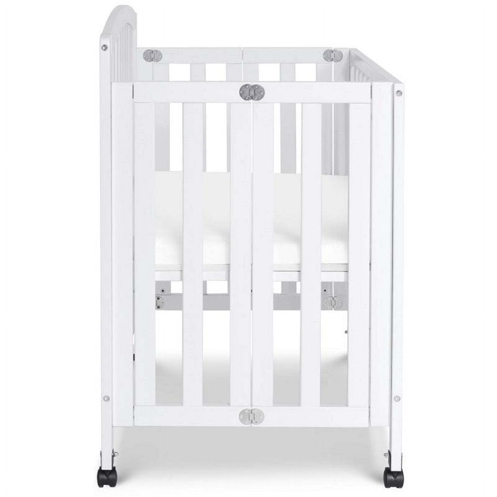DaVinci Dylan Folding Portable 3-in-1 Mini Crib and Twin Bed in White