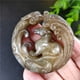 thumbnail image 1 of Antique jade artifacts, antique-style crafts, Xiuyan jade, ancient jade, double-sided carving, dragon and horse spirit pendant, jade pendant., 1 of 3