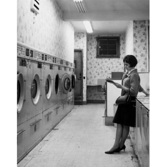 Posterazzi SAL2555354 Side Profile of Young Woman Standing in Laundromat Poster Print - 18 x 24 in.