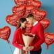 thumbnail image 5 of Paquete de 30 globos laminados con forma de corazón rojo de Gatherfun para fiestas de San Valentín, 5 of 6