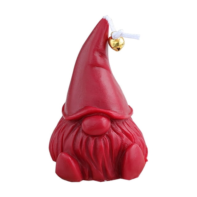 Papá Noel sentado con una vela perfumada estilizada. Tema navideño. Sombrero clásico. Vela perfumada de Papá Noel que crea una cálida atmósfera navideña.