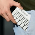 thumbnail image 5 of PPgejGEK Mini Pocket Electronic Piano Music Instrument for Children Beginners Multifunctional Portable Toy in White, 5 of 6