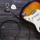thumbnail image 1 of unbranded 1Jgo De Guitarra Acero Inoxidable Para Instrumento Con Estuche De Cuero Gris, 1 of 6