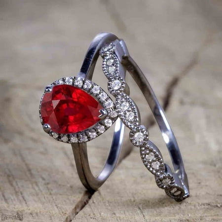 Beautiful 2 Carat Pear Cut Real Ruby And Cubic Halo Wedding Ring Set Beautiful 2 Carat Pear Cut Real Ruby And Cubic Halo Wedding Ring Set In Silver With Black Gold Plating