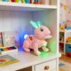 thumbnail image 4 of Juguetes para niños Conejos atados con cuerdas Luces lindas y coloridas Conejos que rebotan con música Animales simulados Conejo eléctrico de plástico, 4 of 6