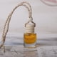thumbnail image 1 of Ambientador colgante y difusor de aceite para automóvil, difusor de aromaterapia, mini botella de vidrio, difusor de fragancia colgante para 10 ml de fragancia, 1 of 3