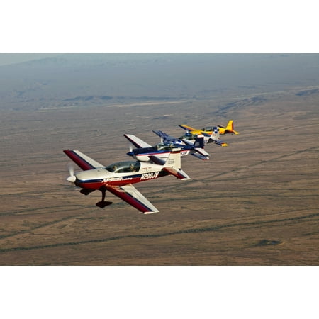 Extra 300 aerobatic aircraft fly in formation over Mesa Arizona Stretched Canvas - Scott GermainStocktrek Images (18 x
