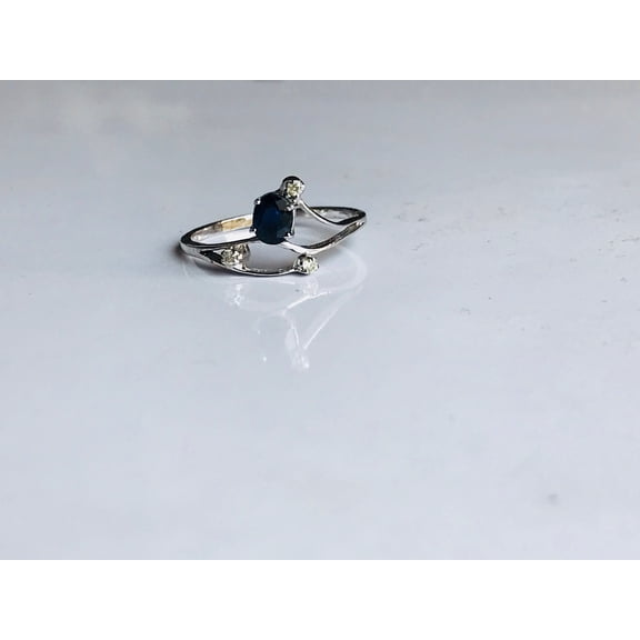 Natural sapphire ring with three diamonds in 925 sterling silver