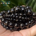 thumbnail image 2 of Cuentas de piedra natural de 6, 8, 10 y 12 mm, color negro y dorado, cuentas redondas de ágata para hacer joyas, pulseras y collares hechos a mano, 15'', 2 of 5