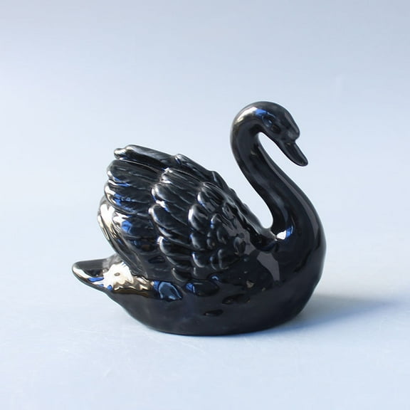 Modern minimalist black and white swan ceramic figurines for couples, a wedding gift, home decor, and wedding room decoration.
