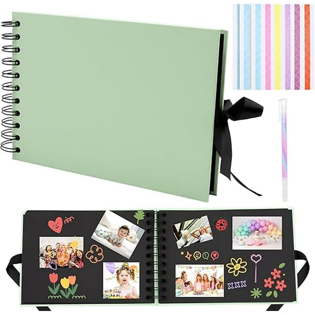 ZYNERY Scrapbooking Photo Albums with 60 pages measuring 21.5 x 15 cm, featuring a green cover with durable coil binding and a black ribbon closure. The kit includes 3 colorful sticker sheets and a multicolored pen for DIY decoration. The album is displayed open, showcasing thick kraft paper pages adorned with photos, stickers, and drawings, ideal for preserving memories from birthdays, weddings, and travel. Additional stickers and the pen are shown separately.