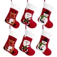 thumbnail image 1 of Toyvian - 6 medias navideñas de fieltro rojo con dibujos animados para colgar, bolsas para dulces, 1 of 5