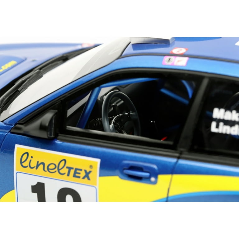 Diecast 2002 Subaru Impreza WRC #10 Blue with Yellow