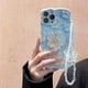 thumbnail image 3 of Funda para iPhone 13 Pro Max con flores azules, a prueba de golpes, con purpurina y estampado floral, con pulsera de cadena de perlas, mariposa y corazón para mujer., 3 of 7