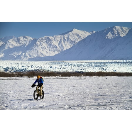 Man Fat Tire Mountain Biking On The Knik Glacier Chugach Mountains Southcentral Alaska Winter