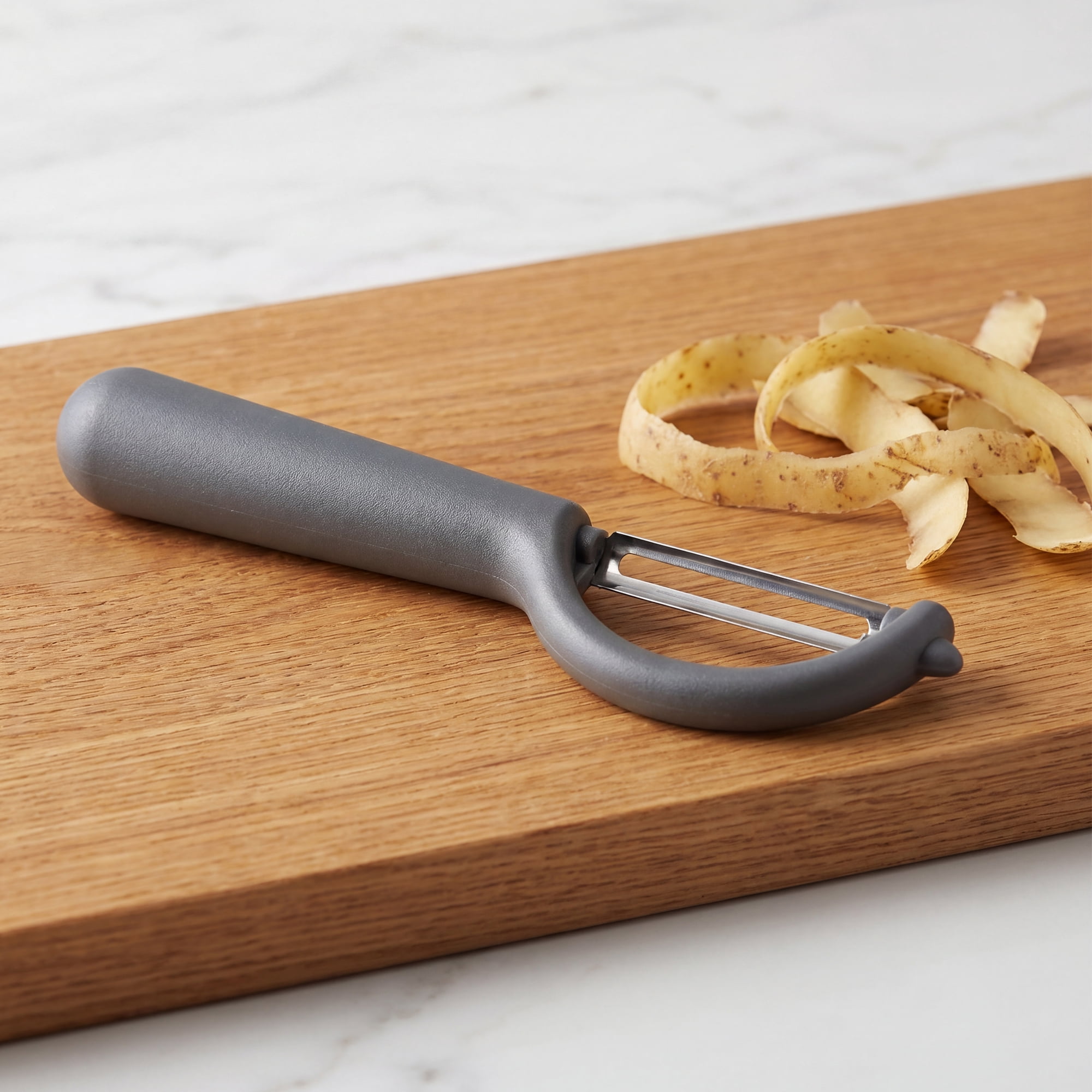 Unique Bargains Plastic Apple and Potato Peeler with Ergonomic Handle Black 6.5x1.4 inch
