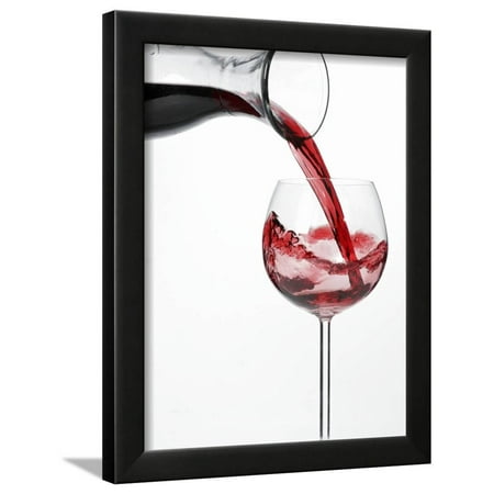 Pouring Red Wine Into Glass From Carafe Framed Print Wall Art By