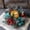 Green, variant on PLJFXXM Artificial Candle Wreath for Table Centerpieces Table Accent Snow Flocked Candle Rings for Christmas Candle Centerpieces Pine Branches, Red Berries, Pinecones Pillars Candle Rings