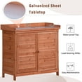 thumbnail image 5 of Outdoor Potting Bench, 39" Rustic Garden Console Table with 2-Tier Shelves and Side Hook, Wooden Workstation with Metal Tabletop Surface and 2 Doors for Park, Mudroom, Backyard, Orange, 5 of 7