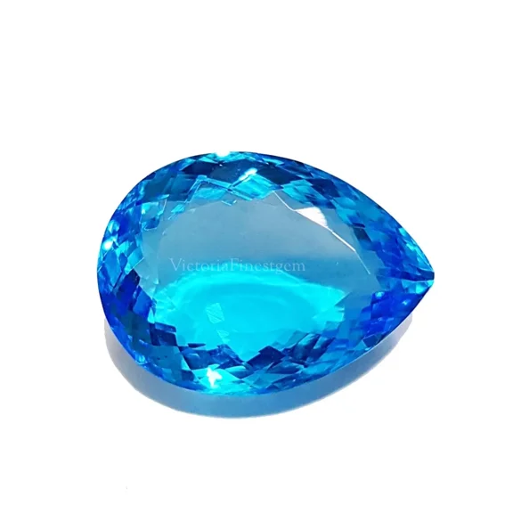 30.50 Carat Blue Topaz Pear Shape Glass Filled Stone Pendent Size Loose Gemstone