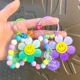 thumbnail image 2 of Llavero con pulsera de cuentas de girasol coloridas y creativas, decoración para bolso de pareja para mujer, llavero colgante para coche, regalo, 2 of 5