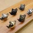 thumbnail image 3 of Tiradores pequeños con forma de taza de té para armario. Cepillado, 3 of 9