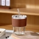 thumbnail image 1 of Vaso de Vidrio con Tapa y Pajilla Reutilizable | Vaso Transparente de 420ml Resistente al Calor | Manga Aislante | Taza Ligera y Portátil para Café, Té, Jugo para Viaje | 11.7x8x8cm | Azul, Rosa, 1 of 6